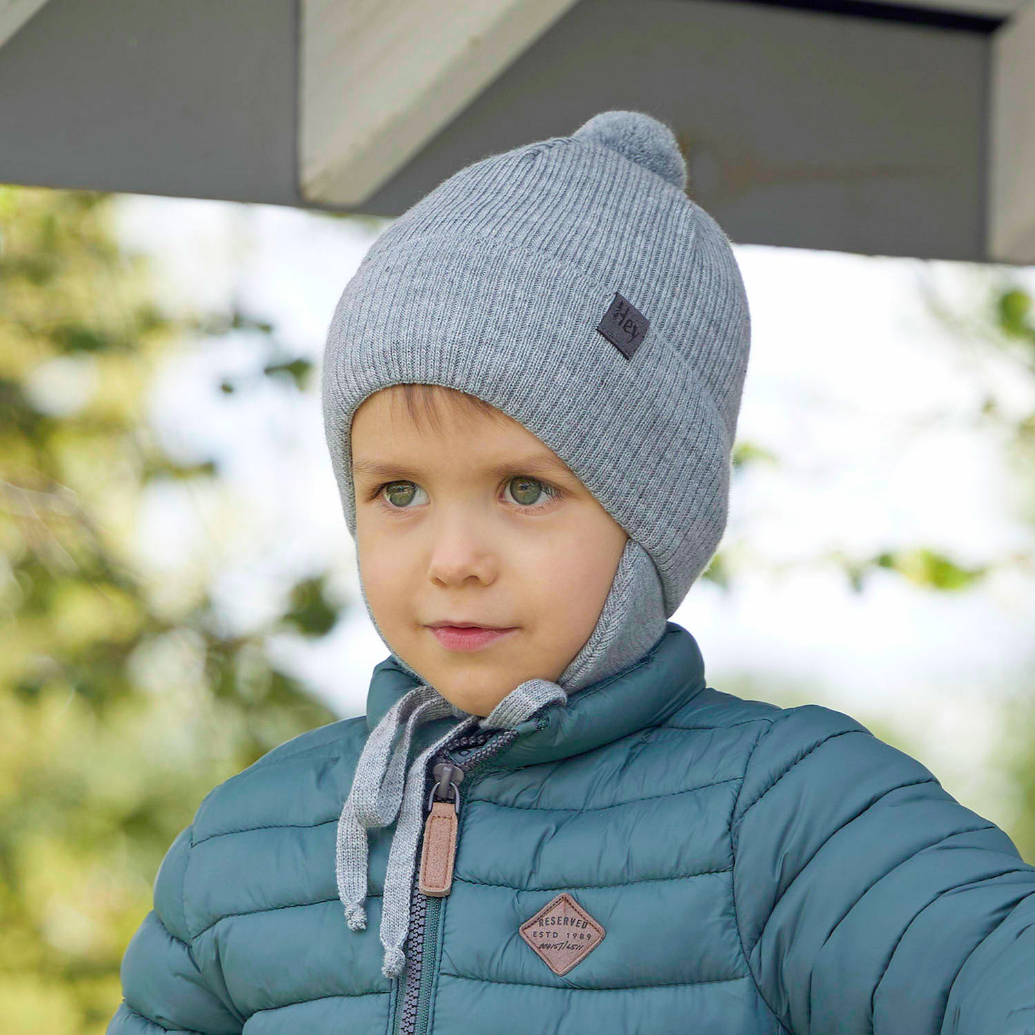 Pojke höst/vår mössa, blå, med knytband, med pompom, Axel